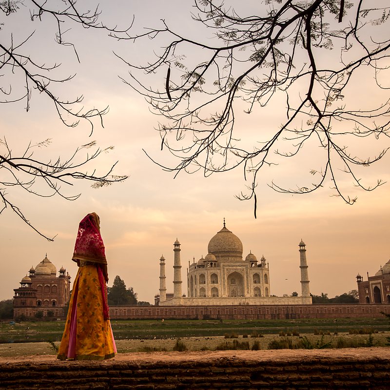 A guest in a red sari on the Taj Mahal terrace